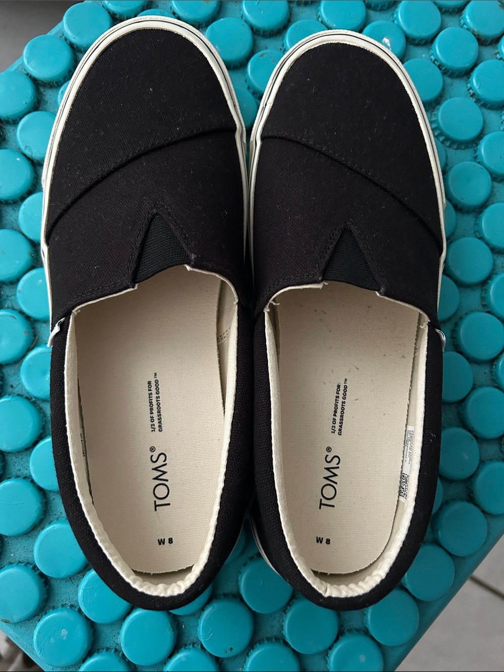 TOMS Women’s Classic Slip-On Moccasins in Black and Cream